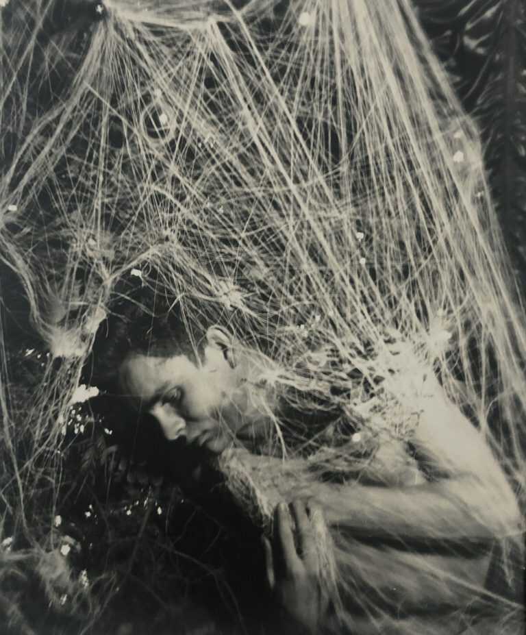 Photograph by George Platt Lynes: [Chuck Howard in Christmas Tree], available at Childs Gallery, Boston