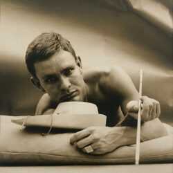 Photograph by George Platt Lynes: [Chuck Howard Laying Down with Arrow], available at Childs Gallery, Boston