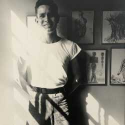 Photograph by George Platt Lynes: [Chuck Howard Standing Against Wall], available at Childs Gallery, Boston