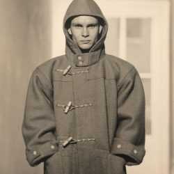 Photograph by George Platt Lynes: [Chuck Howard Wearing A Coat], available at Childs Gallery, Boston