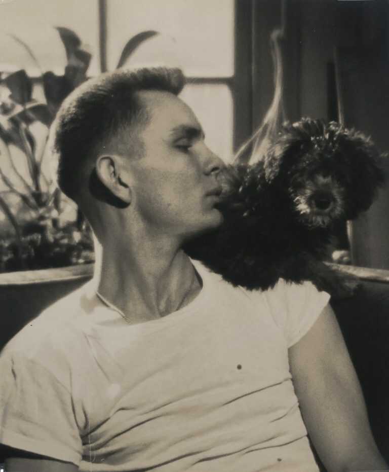 Photograph by George Platt Lynes: [Chuck Howard with Dog], available at Childs Gallery, Boston