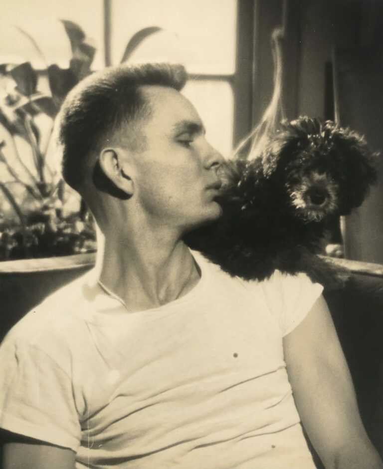 Photograph by George Platt Lynes: [Chuck Howard with Dog], available at Childs Gallery, Boston