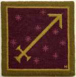 Textile by Natalie Hays Hammond: Sign of the Planet Sagittarius (According to Rudolph Koch), available at Childs Gallery, Boston